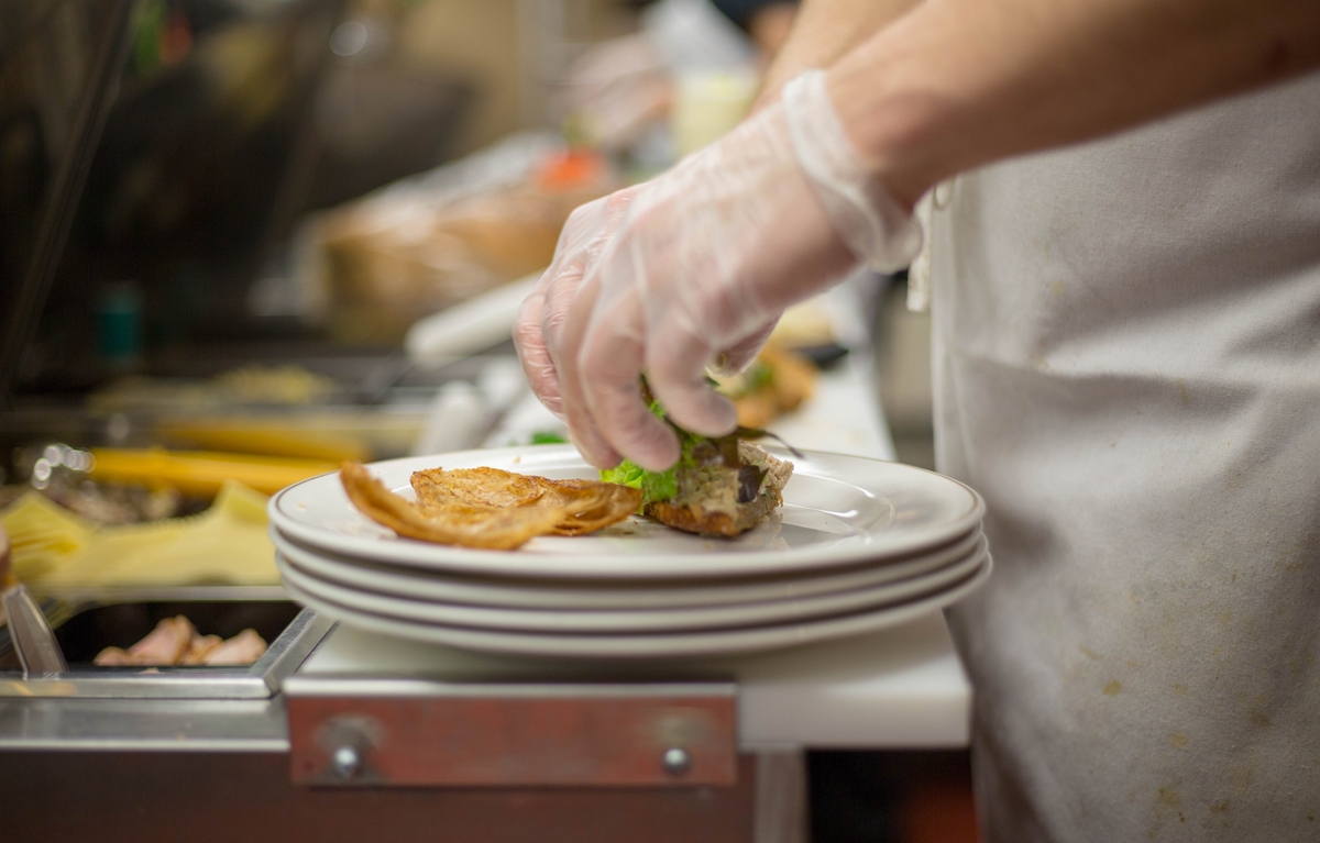 Chef is preparing food in the kitchen